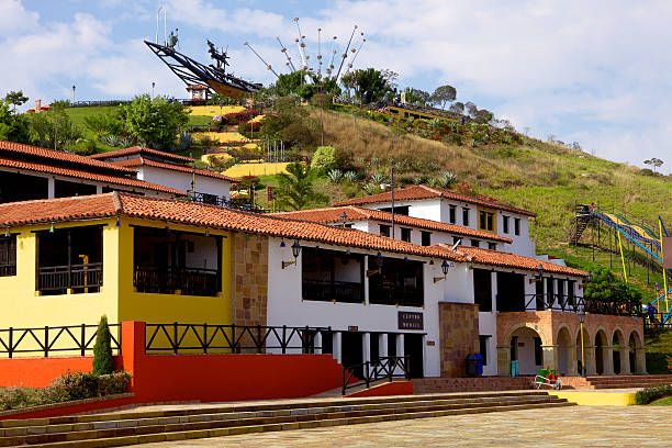 Chicamocha, Colombia - January 14, 2014: Buildings and attractions in the Parque Nacional del Chicamocha or in English, the Chicamocha National Park. The influence of Spanish colonial architecture is obvious. In the background are some attractions and the Andes mountains; the elevation here is about 1500 metres above sea level.