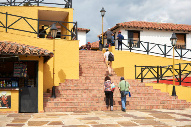 Aratoca, Santander, Colombia, Nov 23, 2022: Tourists seen from the back walking through Chicamocha National Park, a popular tourist destination in this Andean region.